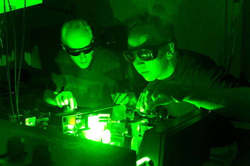 David Turton and Klaas Wynne working on the laser – (c) 2008 Gregor Welsh, University of Strathclyde, Physics Department, SUPA